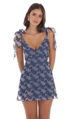 Picture Floral A-line Dress in Navy. Source: https://media-img.lucyinthesky.com/data/Aug24/150xAUTO/40ae82b6-8f34-46f0-bff6-a14e1a77ee00.jpg