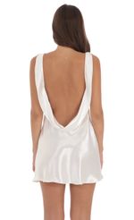 Picture Satin Open Back Dress in White. Source: https://media-img.lucyinthesky.com/data/Aug24/150xAUTO/416a3ae2-f394-4f9d-b904-da7331183145.jpg