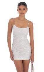 Picture Silver Sequin Bodycon Dress in White. Source: https://media-img.lucyinthesky.com/data/Aug24/150xAUTO/55e7a6e1-9ae0-4d4b-aa78-2aef6d84080a.jpg