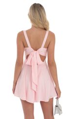 Picture Sequin Bow Tie A-Line Dress in Nude Pink. Source: https://media-img.lucyinthesky.com/data/Aug24/150xAUTO/5dda5106-d001-4308-a682-af8a68061f6a.jpg