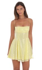 Picture Sequin Fit and Flare Dress in Golden Yellow. Source: https://media-img.lucyinthesky.com/data/Aug24/150xAUTO/77863613-9307-4955-ad1e-a9f84a3ee424.jpg