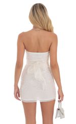 Picture Pearl Sequin Strapless Bodycon Dress in White. Source: https://media-img.lucyinthesky.com/data/Aug24/150xAUTO/7c772ac9-1633-46b1-b901-fd8d2f699d64.jpg