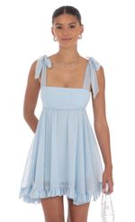 Picture Shimmer Ruffle Babydoll Dress in Blue. Source: https://media-img.lucyinthesky.com/data/Aug24/150xAUTO/88b770a1-3467-4bdc-90dd-3131f78a3473.jpg