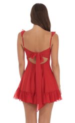 Picture Shimmer Chiffon Ruffle Strap Dress in Red. Source: https://media-img.lucyinthesky.com/data/Aug24/150xAUTO/8aa2712d-cc37-4018-ad3a-ff8324f265e4.jpg