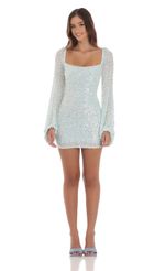 Picture Sequin Long Sleeve Dress in Aqua Blue. Source: https://media-img.lucyinthesky.com/data/Aug24/150xAUTO/a2839ee6-cbe7-4920-9c29-2e168de0b420.jpg