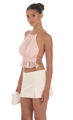 Picture Pearl Shimmer Halter Top in Light Pink. Source: https://media-img.lucyinthesky.com/data/Aug24/150xAUTO/a54a1013-c83d-4c0b-96cd-4c1e1cf43121.jpg