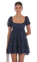 Picture Floral Chiffon Fit and Flare Dress in Navy. Source: https://media-img.lucyinthesky.com/data/Aug24/150xAUTO/f88534f5-8fd6-4336-905a-0ab2aeeebc86.jpg