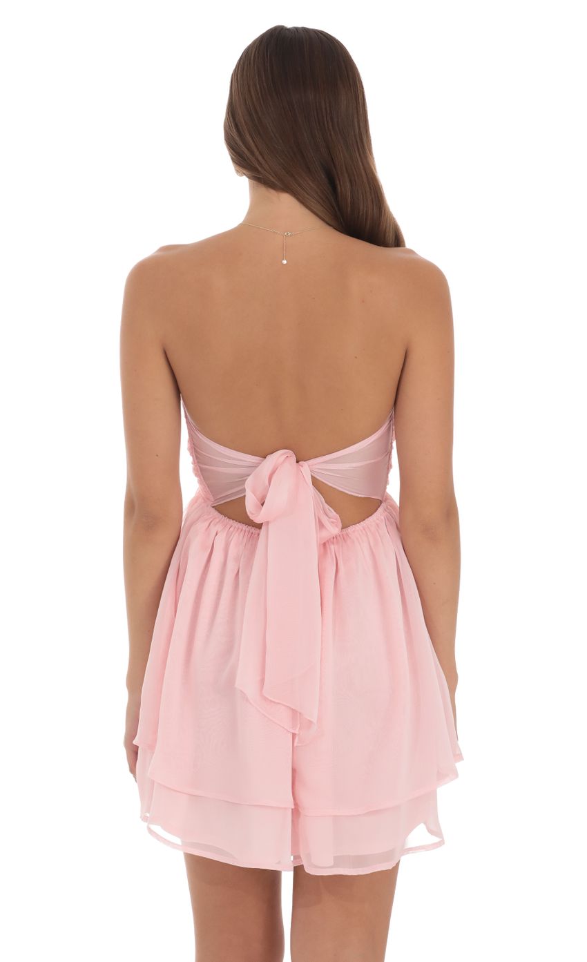 Picture Two-Toned Chiffon Cutout Babydoll Dress in Pink. Source: https://media-img.lucyinthesky.com/data/Aug24/850xAUTO/07752298-4d05-4826-85c4-595322d5a9aa.jpg