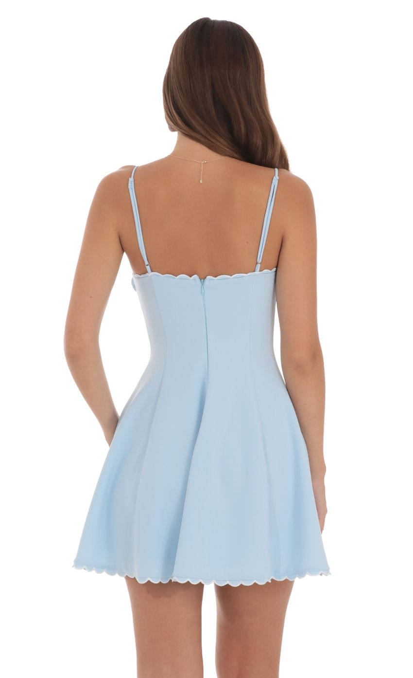 Picture Scallop Fold Over Dress in Blue. Source: https://media-img.lucyinthesky.com/data/Aug24/850xAUTO/0e2567c0-2120-4faf-b14e-f4f527f67d6f.jpg