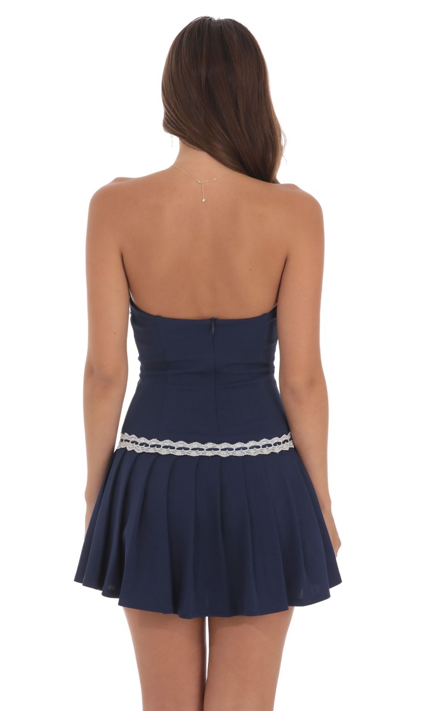 Picture Strapless Pleated Dress in Navy. Source: https://media-img.lucyinthesky.com/data/Aug24/850xAUTO/11b57442-d413-40e2-a23c-3456b935ec6b.jpg