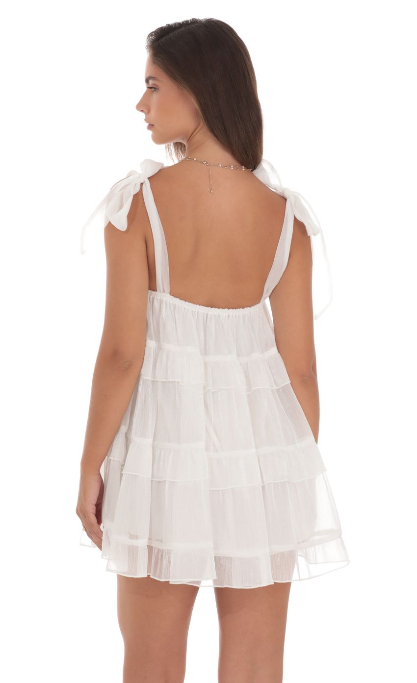 Picture Ruffle Shift Dress in White. Source: https://media-img.lucyinthesky.com/data/Aug24/850xAUTO/12f3aab7-e979-41d1-b7da-63c4c256785d.jpg