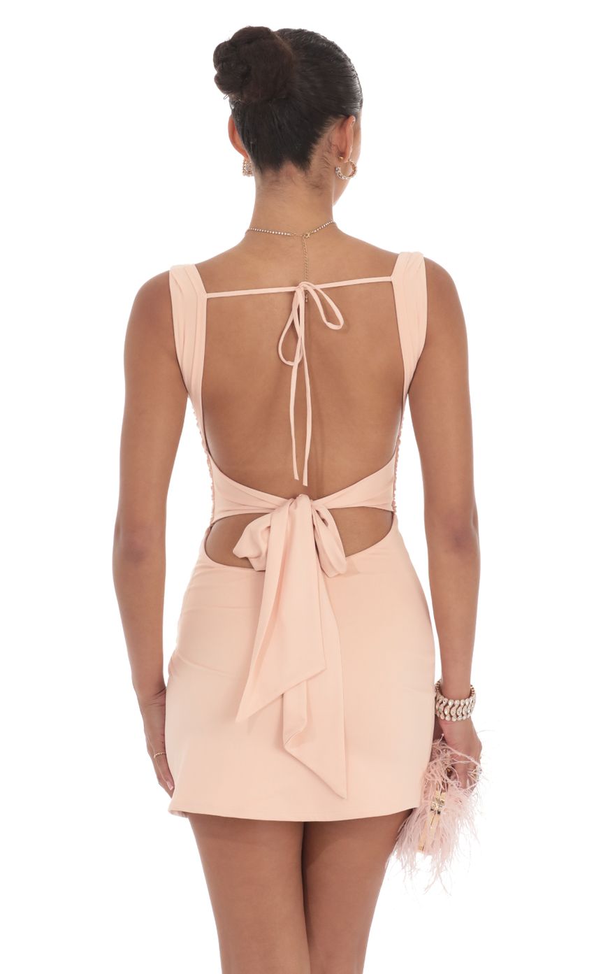 Picture Ruched Bodycon Dress in Peach. Source: https://media-img.lucyinthesky.com/data/Aug24/850xAUTO/1e104d50-7044-42b0-a5e9-661436f1eea3.jpg