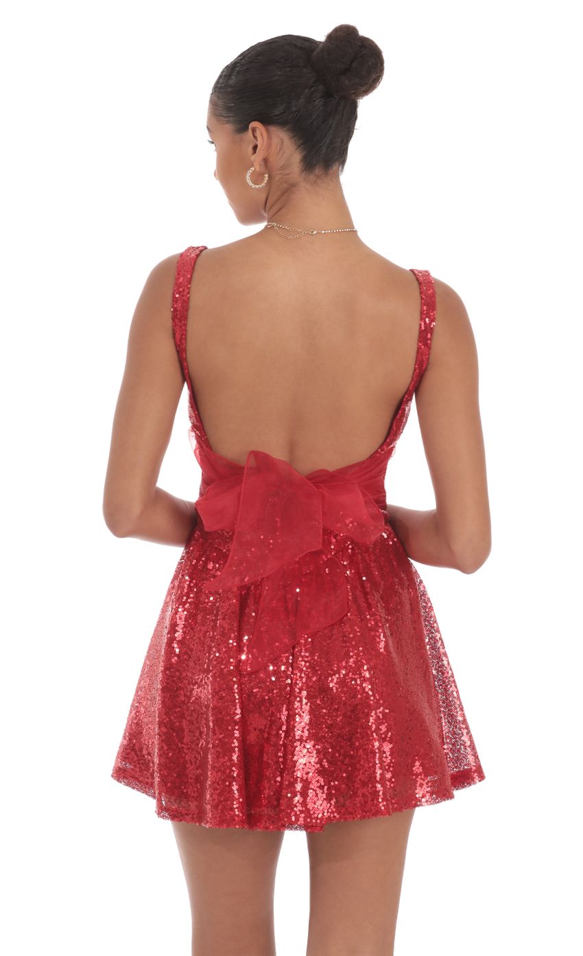 Picture Sequin Open Back Bow Dress in Red. Source: https://media-img.lucyinthesky.com/data/Aug24/850xAUTO/23e4a90d-f553-4188-a03c-cf90e504cc4c.jpg