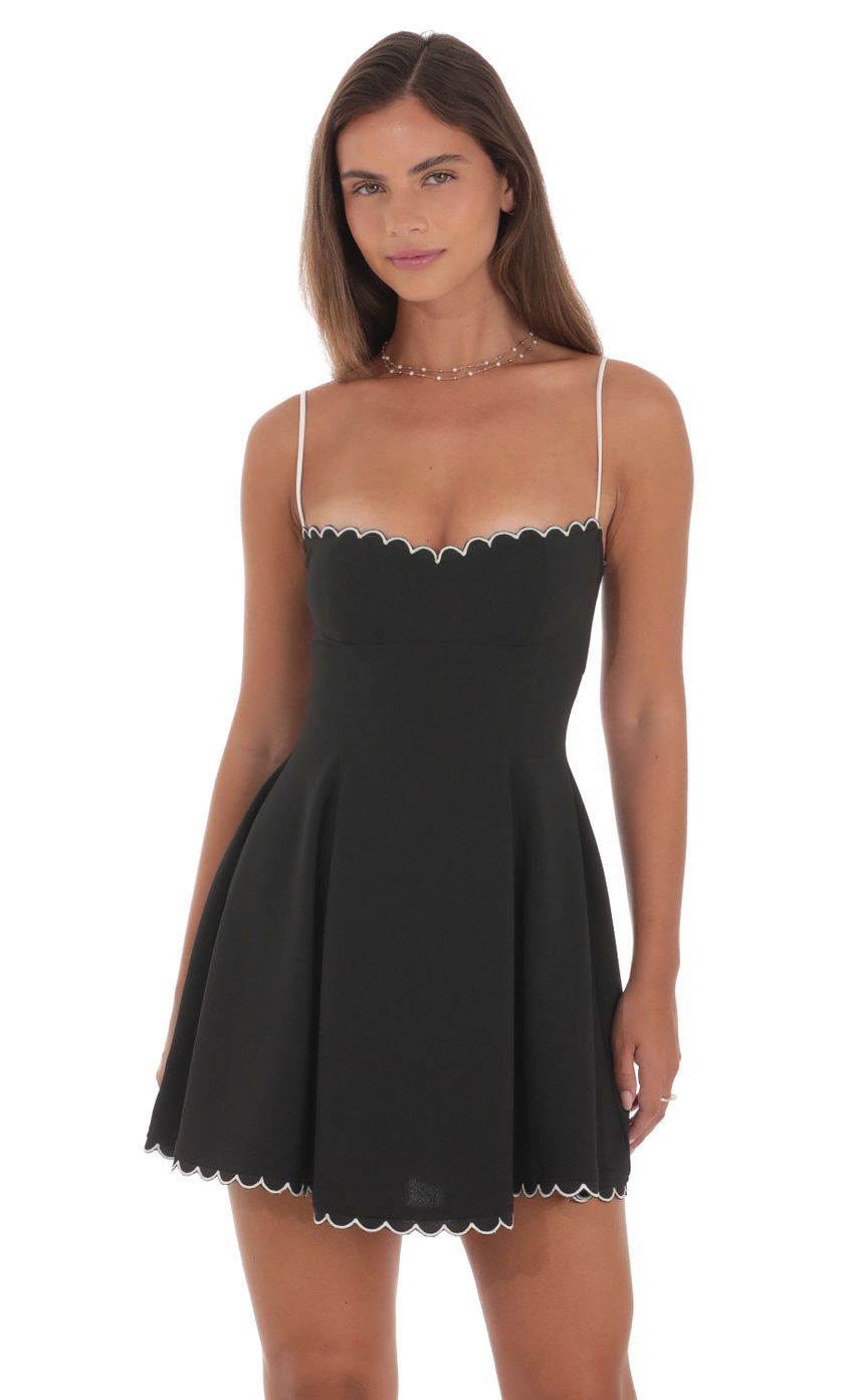 Picture Scallop Trim Fit and Flare Dress in Black. Source: https://media-img.lucyinthesky.com/data/Aug24/850xAUTO/32c945b2-94a8-483b-97cc-b688dddc4fa9.jpg