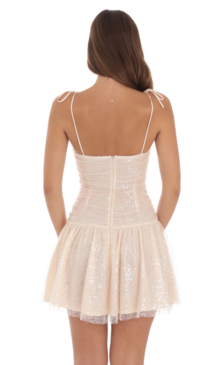 Picture Sequin Ruched Fit and Flare Dress in Peachy Pink. Source: https://media-img.lucyinthesky.com/data/Aug24/850xAUTO/39e48925-7eff-4e8d-8384-56e4fad0c8e7.jpg