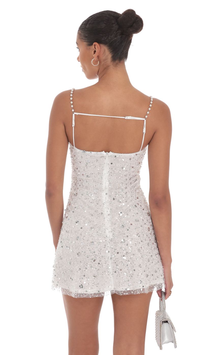 Picture Pearl Strap Sequin Dress in White. Source: https://media-img.lucyinthesky.com/data/Aug24/850xAUTO/65ada697-74a9-44ea-94c4-727127d88ea9.jpg