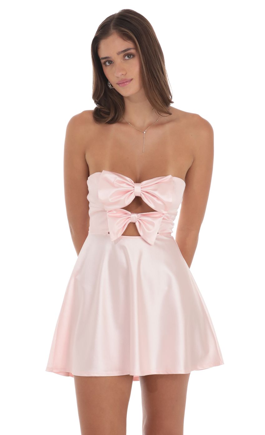 Picture Satin Double Bow Cutout Dress in Pink. Source: https://media-img.lucyinthesky.com/data/Aug24/850xAUTO/71b418d3-8b53-498a-8734-cd529318e9e8.jpg