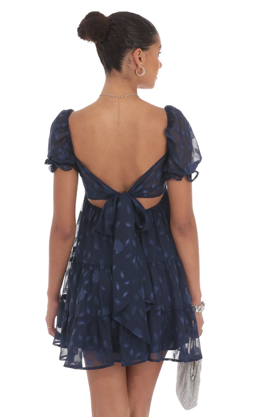 Picture Floral Chiffon Fit and Flare Dress in Navy. Source: https://media-img.lucyinthesky.com/data/Aug24/850xAUTO/7362d57d-e842-4082-bef0-6fdc632e2953.jpg