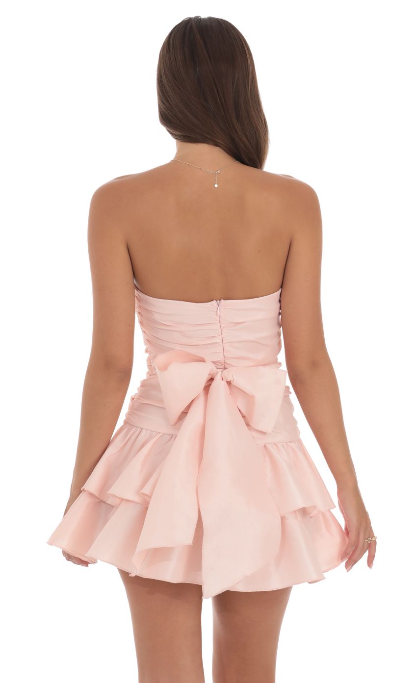 Picture Strapless Cutout Ruffle Dress in Pink. Source: https://media-img.lucyinthesky.com/data/Aug24/850xAUTO/82e5cd93-a1e2-4340-bff8-c3e308ce6d6d.jpg