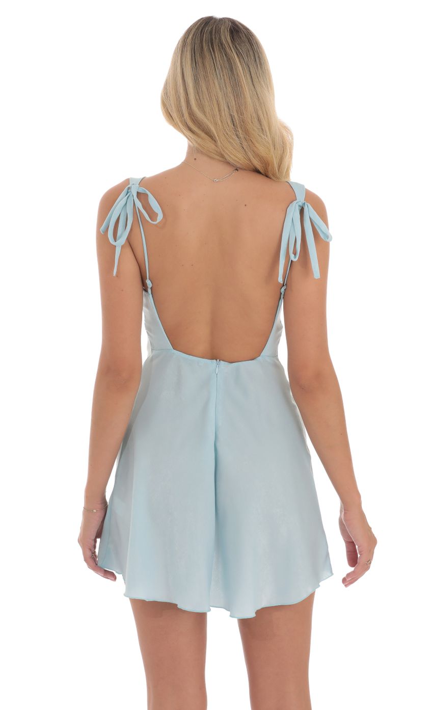 Picture Satin Lace Trim Open Back Dress in Blue. Source: https://media-img.lucyinthesky.com/data/Aug24/850xAUTO/9cc47882-e86d-4e76-baf0-cac39cf4b9f1.jpg