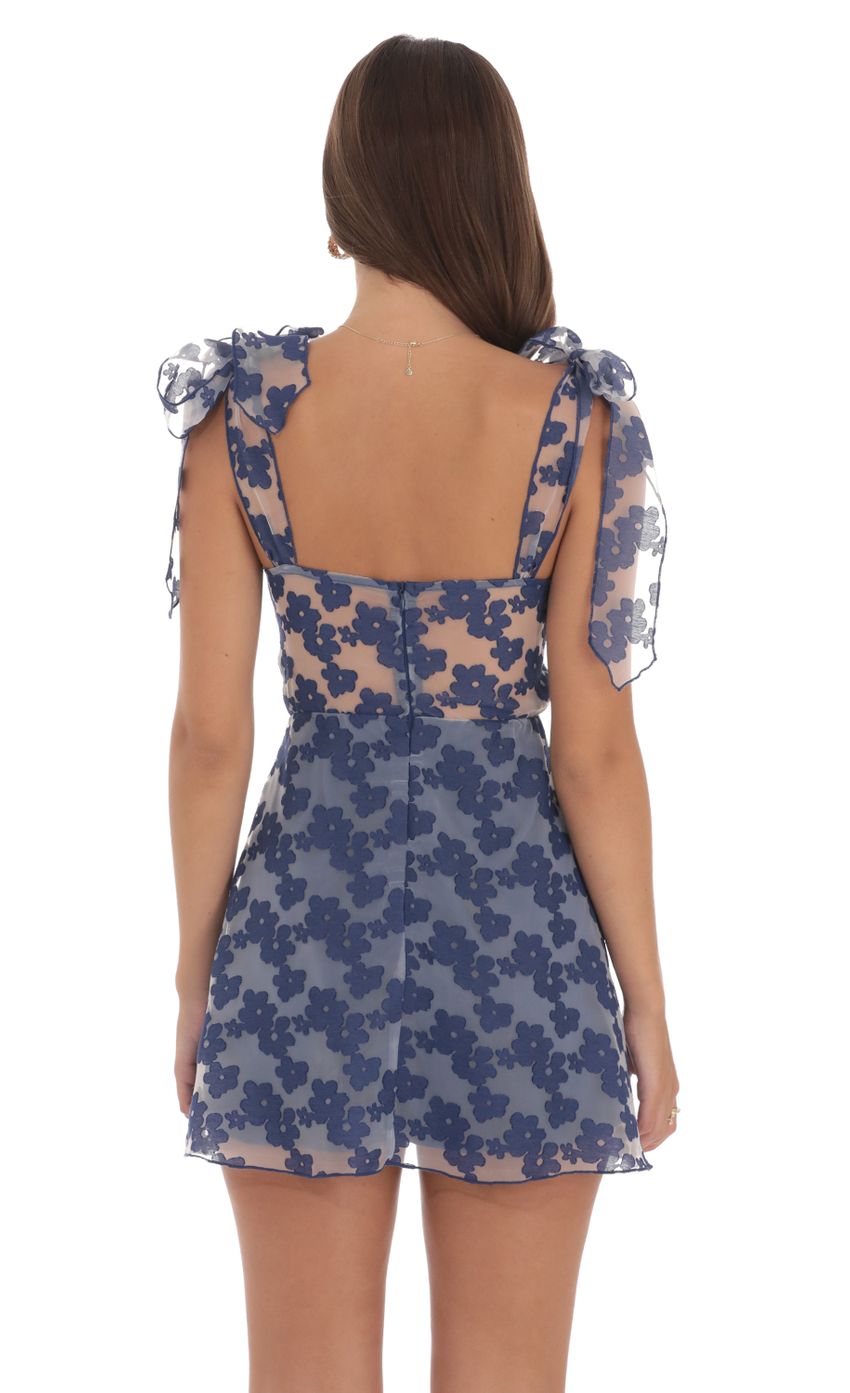 Picture Floral A-line Dress in Navy. Source: https://media-img.lucyinthesky.com/data/Aug24/850xAUTO/a9b800d9-8c62-421e-af21-0b62bab6ef72.jpg