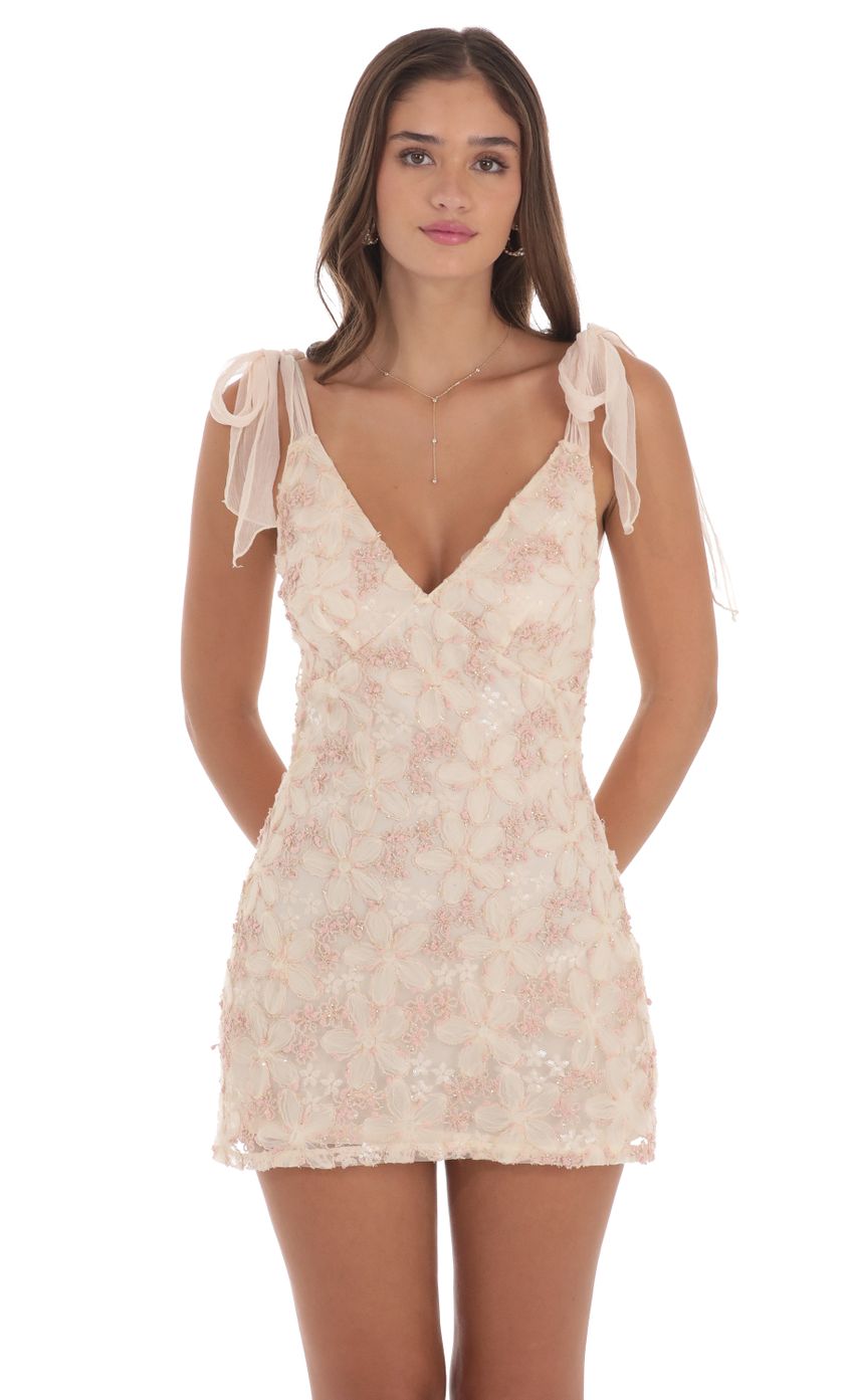 Picture Textured Shimmer Floral Dress in Cream. Source: https://media-img.lucyinthesky.com/data/Aug24/850xAUTO/b433ed03-a301-4643-bf13-9ae4c9e12134.jpg