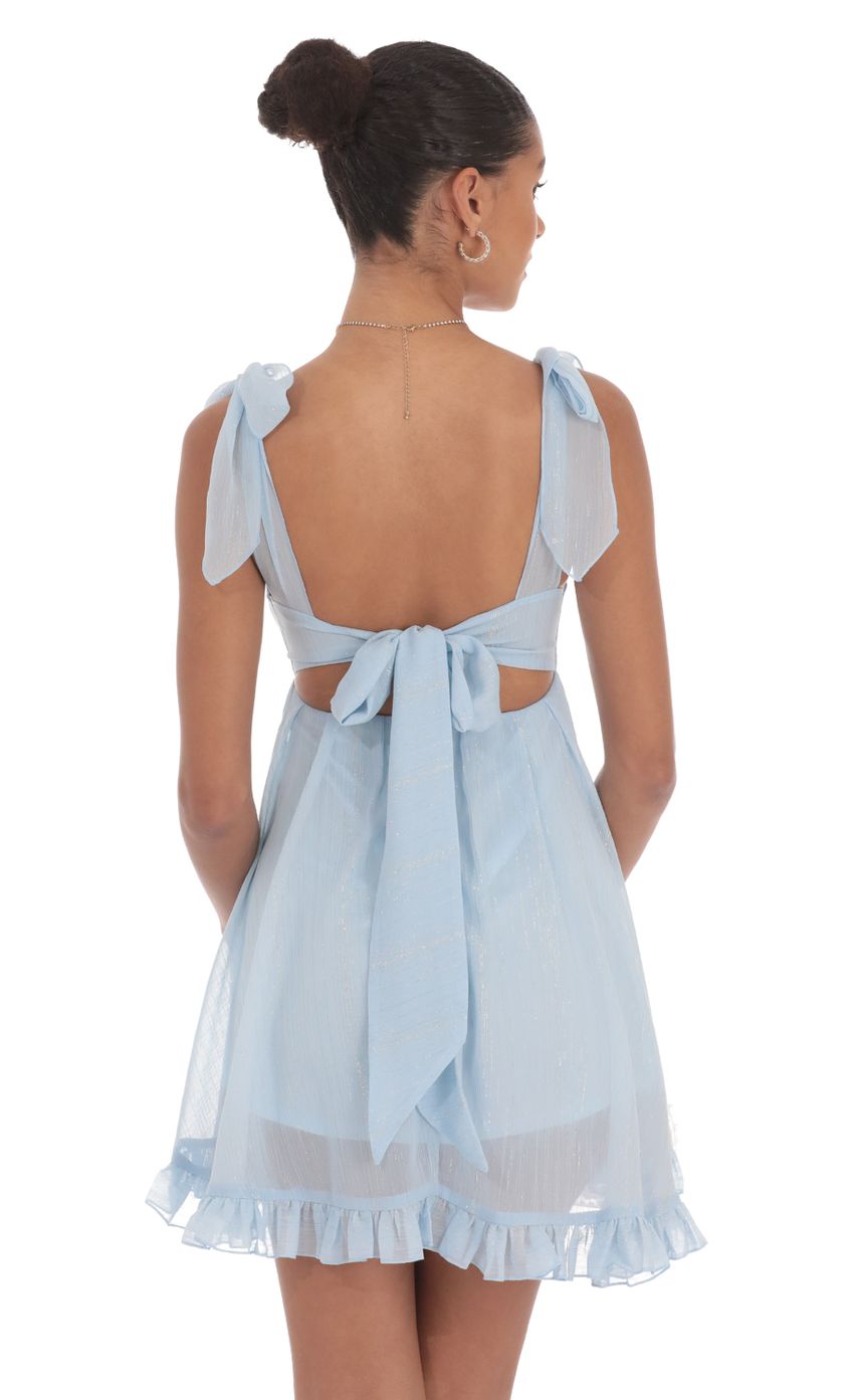 Picture Shimmer Ruffle Babydoll Dress in Blue. Source: https://media-img.lucyinthesky.com/data/Aug24/850xAUTO/b4f8bd8d-0954-4598-9a18-b6cf5581a356.jpg