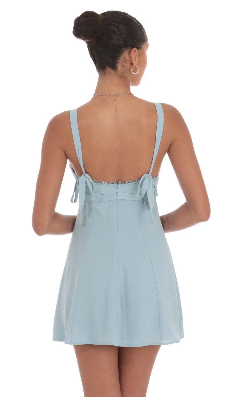 Picture Shimmer Ribbon Embroidered Trim Dress in Blue. Source: https://media-img.lucyinthesky.com/data/Aug24/850xAUTO/ca215e43-0c65-4042-85fc-8276ccc4db21.jpg