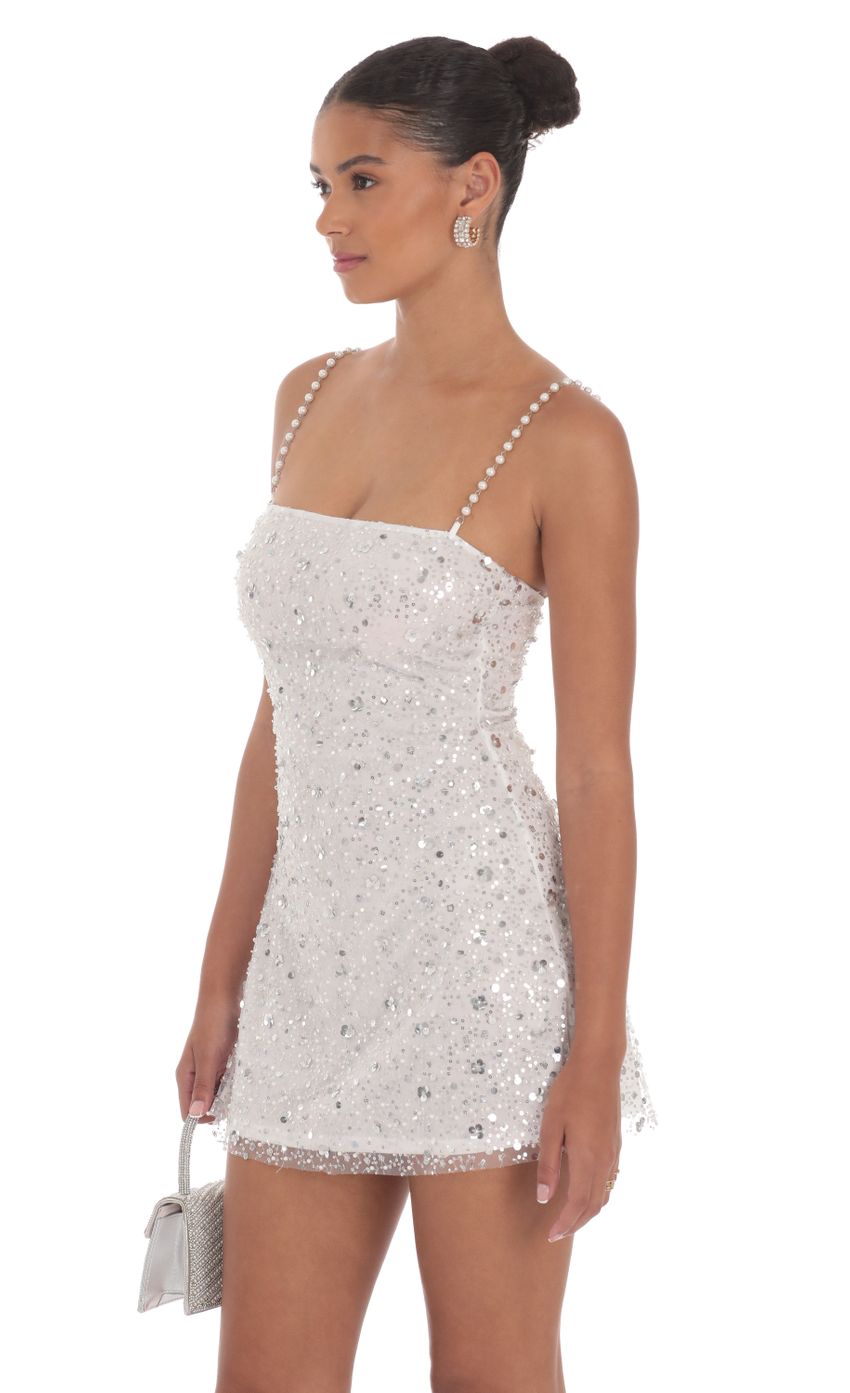 Picture Pearl Strap Sequin Dress in White. Source: https://media-img.lucyinthesky.com/data/Aug24/850xAUTO/d158a24a-be0a-4d61-8954-b99c1dcf69f9.jpg