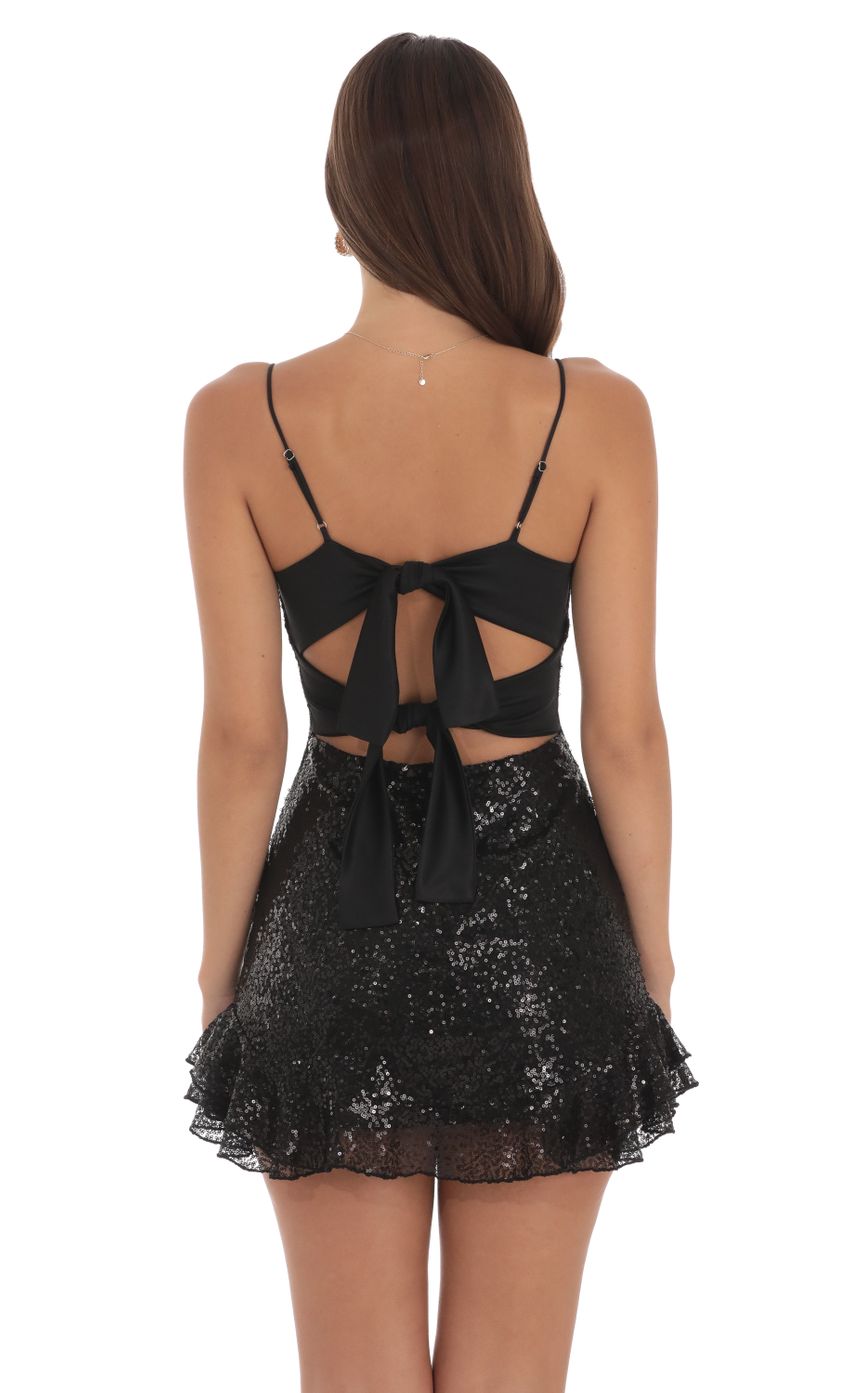 Picture Sequin Ruffle Dress in Black. Source: https://media-img.lucyinthesky.com/data/Aug24/850xAUTO/d2a7c980-6b42-4053-9600-04d479569fdc.jpg