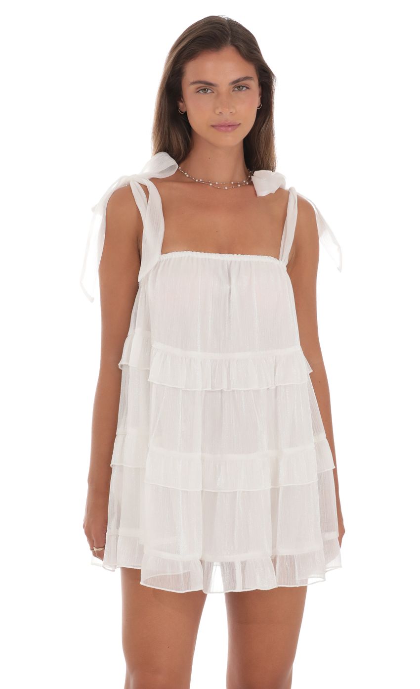 Picture Ruffle Shift Dress in White. Source: https://media-img.lucyinthesky.com/data/Aug24/850xAUTO/dfdf3fe7-b37f-4e44-bd42-0cb812a5ad81.jpg