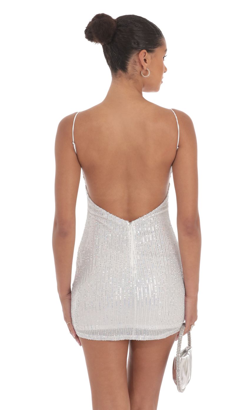 Picture Silver Sequin Bodycon Dress in White. Source: https://media-img.lucyinthesky.com/data/Aug24/850xAUTO/e2fc2dee-ed62-4ea9-a8e6-48fc4db35748.jpg