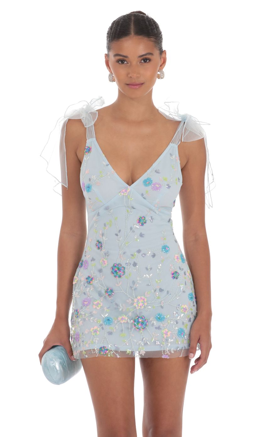 Picture Floral Sequin V-Neck Dress in Blue. Source: https://media-img.lucyinthesky.com/data/Aug24/850xAUTO/f254721b-04e5-4511-b40c-8f2059a4d44f.jpg