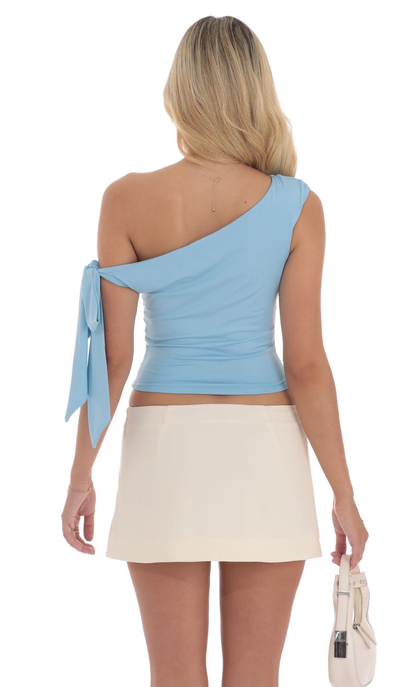 Picture Off Should Tie Sleeve Top in Blue. Source: https://media-img.lucyinthesky.com/data/Aug24/850xAUTO/ffa01d91-15f5-4514-94a3-de3719338e13.jpg