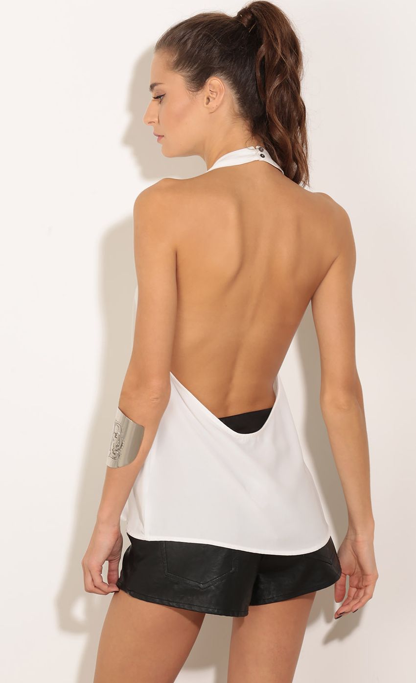 Picture Open-Back Halter Top In White. Source: https://media-img.lucyinthesky.com/data/Dec15_2/850xAUTO/0Y5A0898.JPG