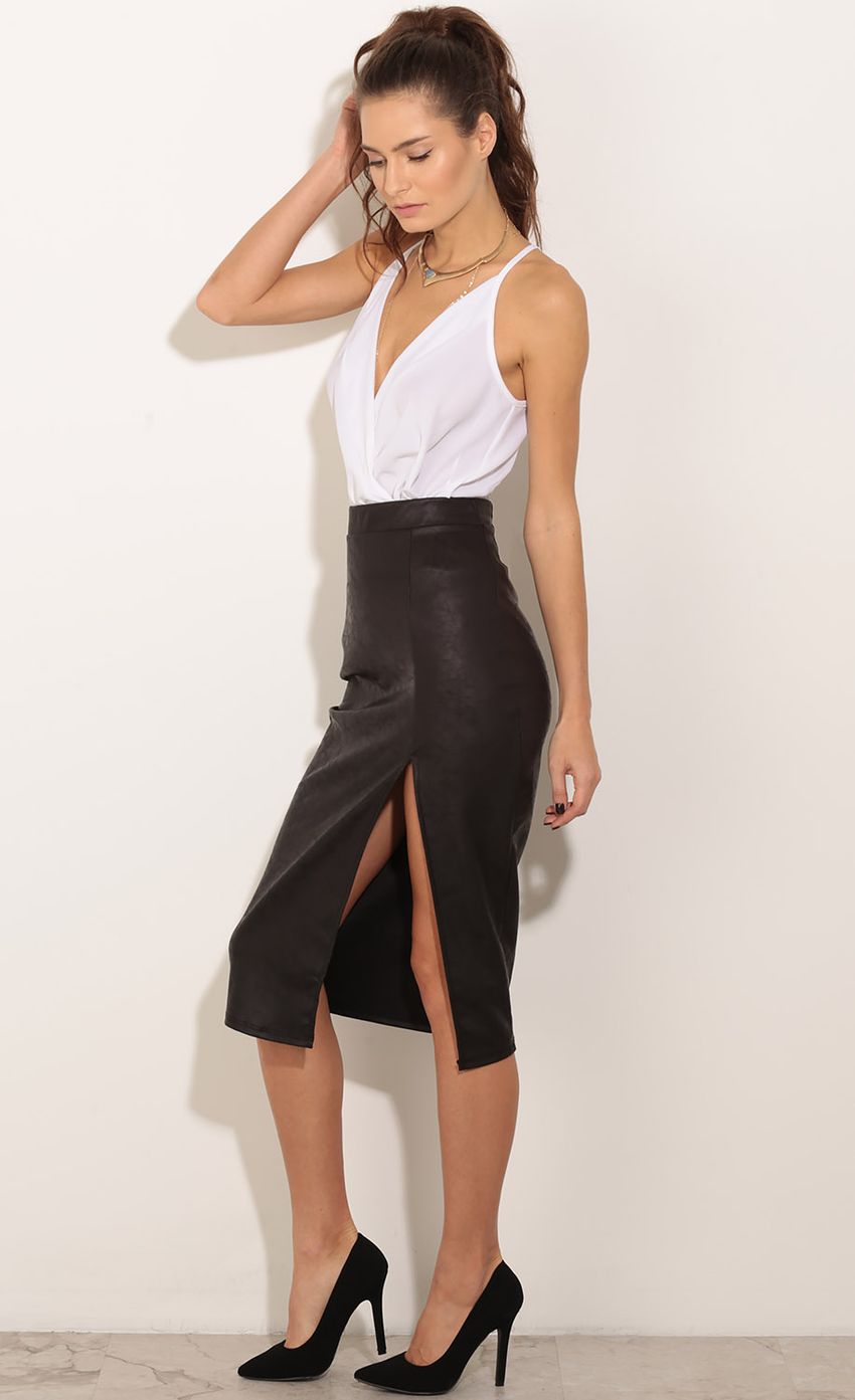 Picture PU Leather Slit Skirt In Black. Source: https://media-img.lucyinthesky.com/data/Dec15_2/850xAUTO/0Y5A1087.JPG