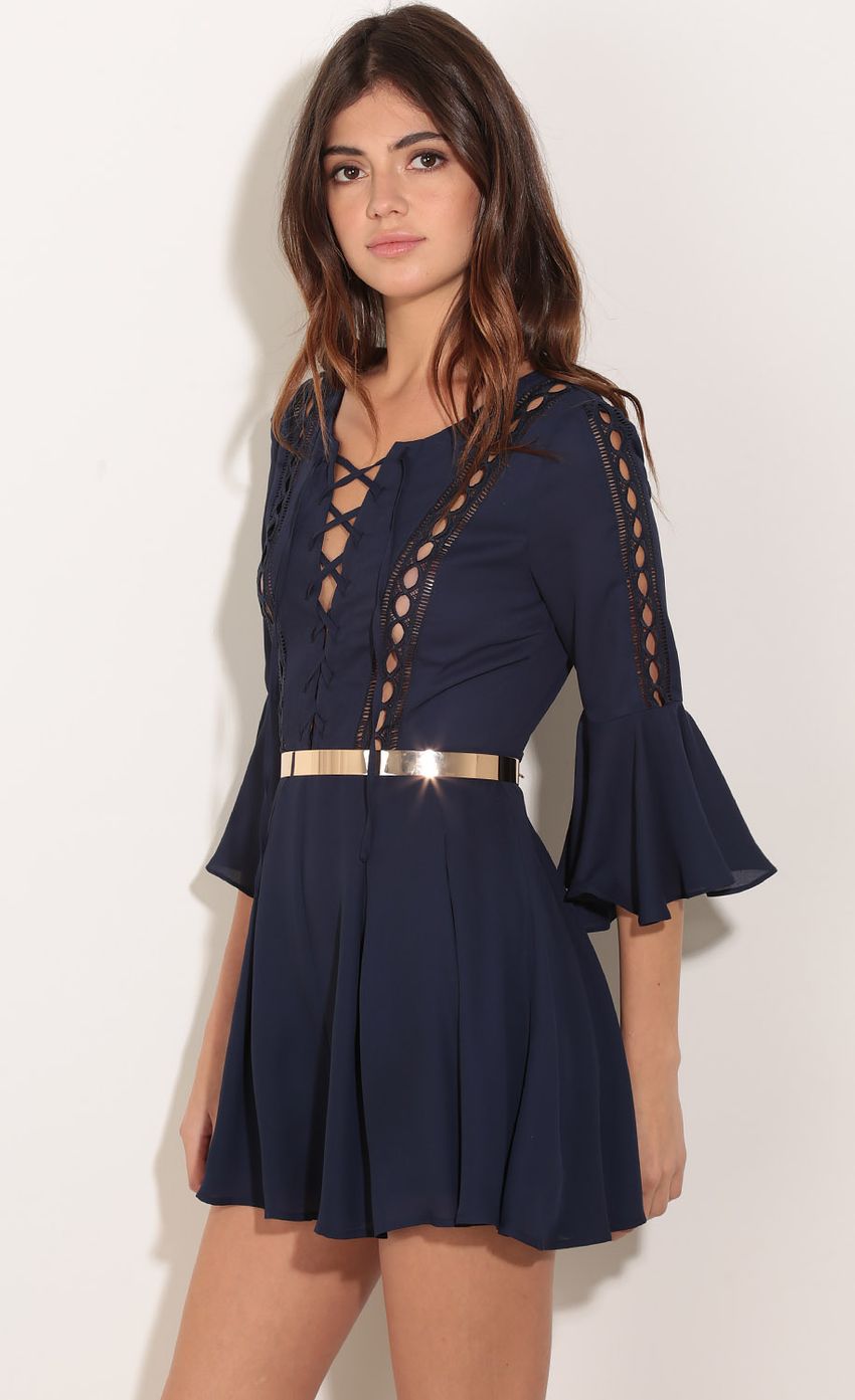 Picture Bell Sleeve Playsuit In Midnight Blue. Source: https://media-img.lucyinthesky.com/data/Dec15_2/850xAUTO/0Y5A2586.JPG