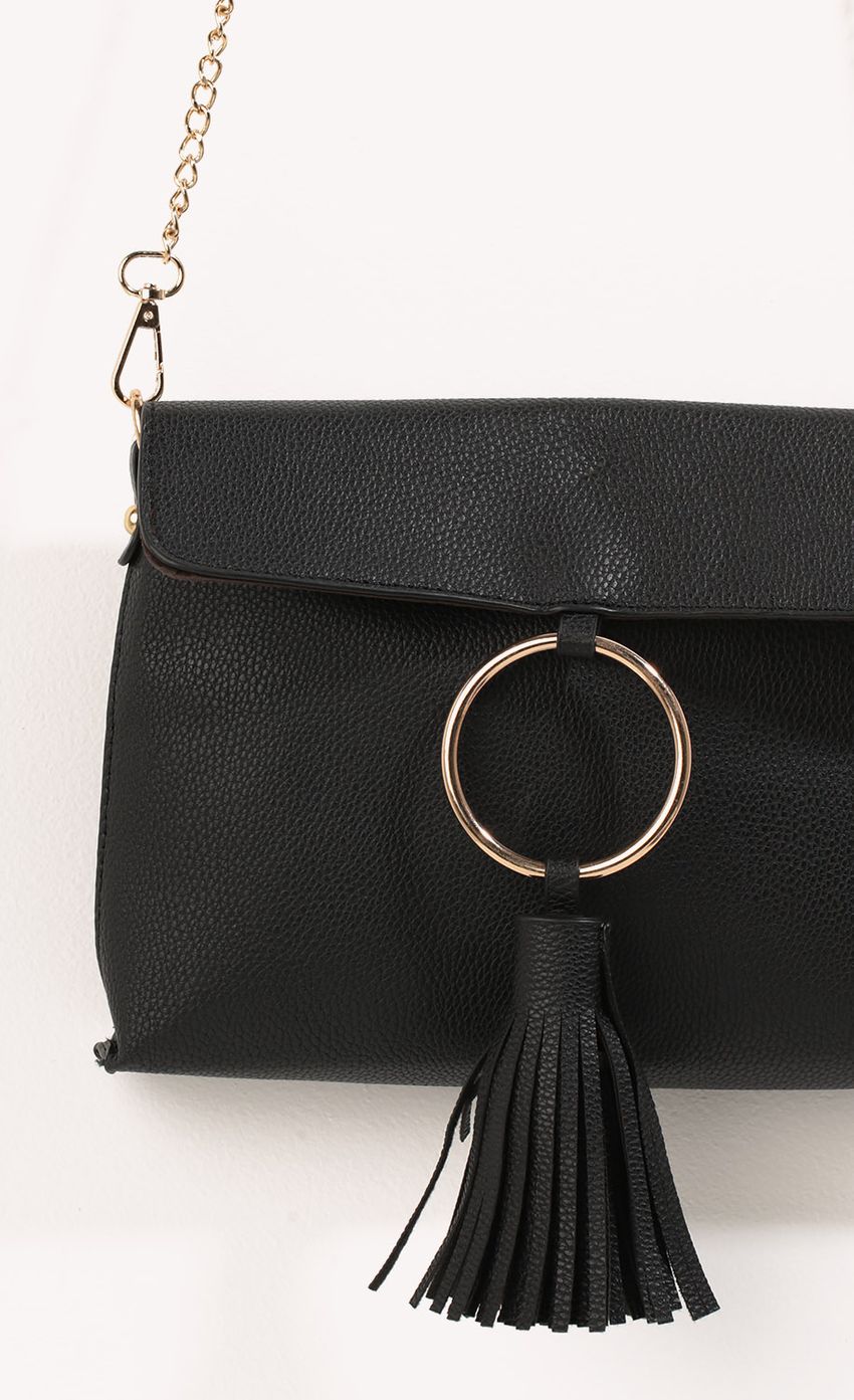 Picture Faux Leather Purse In Black. Source: https://media-img.lucyinthesky.com/data/Dec16_2/850xAUTO/0Y5A0649.JPG
