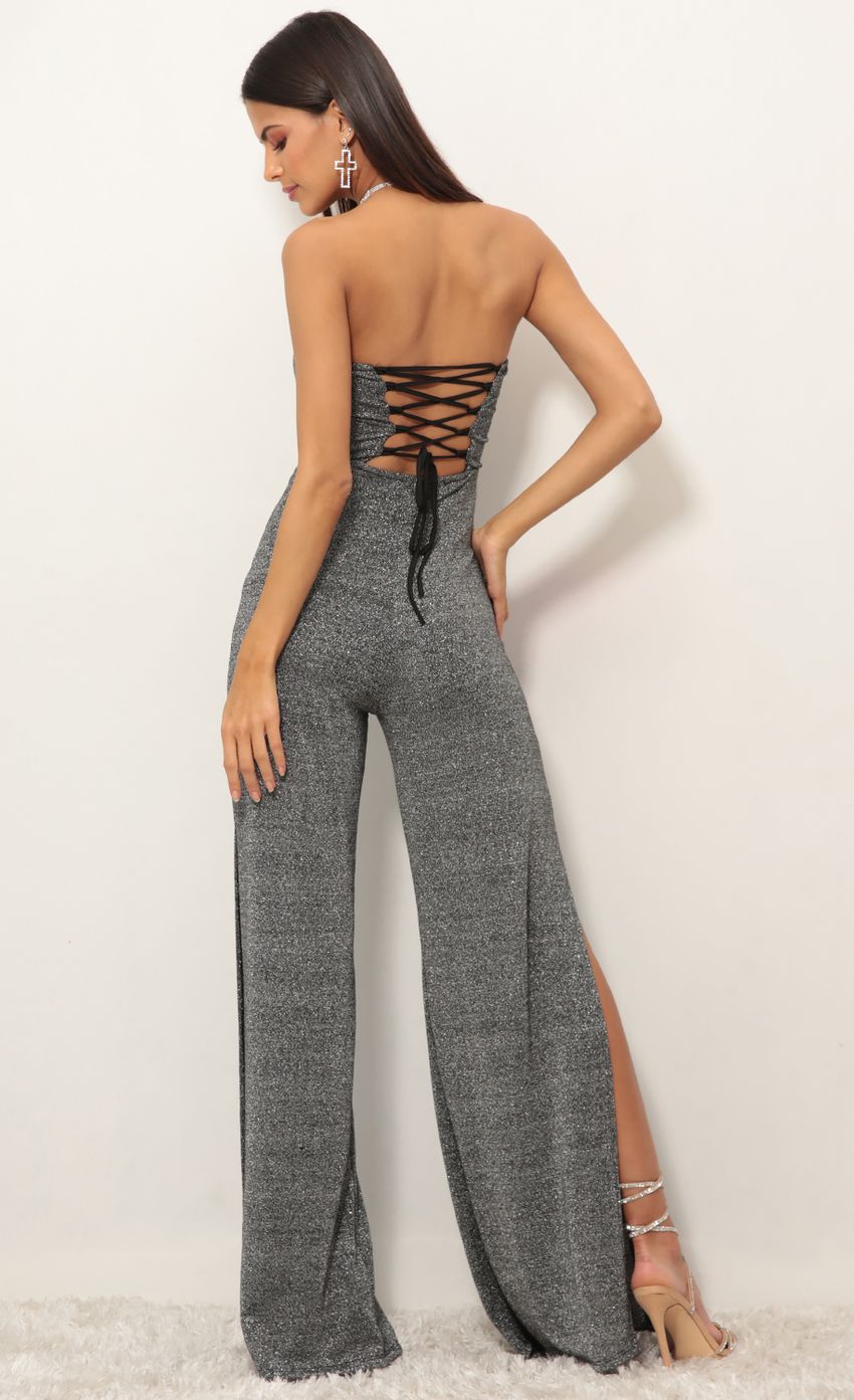 Picture Carina Cutout Jumpsuit in Silver Shimmer. Source: https://media-img.lucyinthesky.com/data/Dec18_2/850xAUTO/0Y5A9229S.JPG