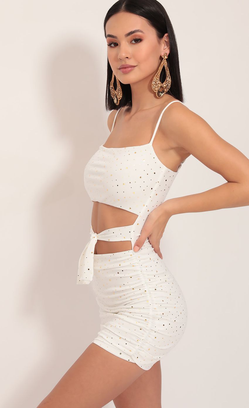 Picture Twinkling Cutout Dress in Ivory Gold. Source: https://media-img.lucyinthesky.com/data/Dec19_1/850xAUTO/781A0865.JPG