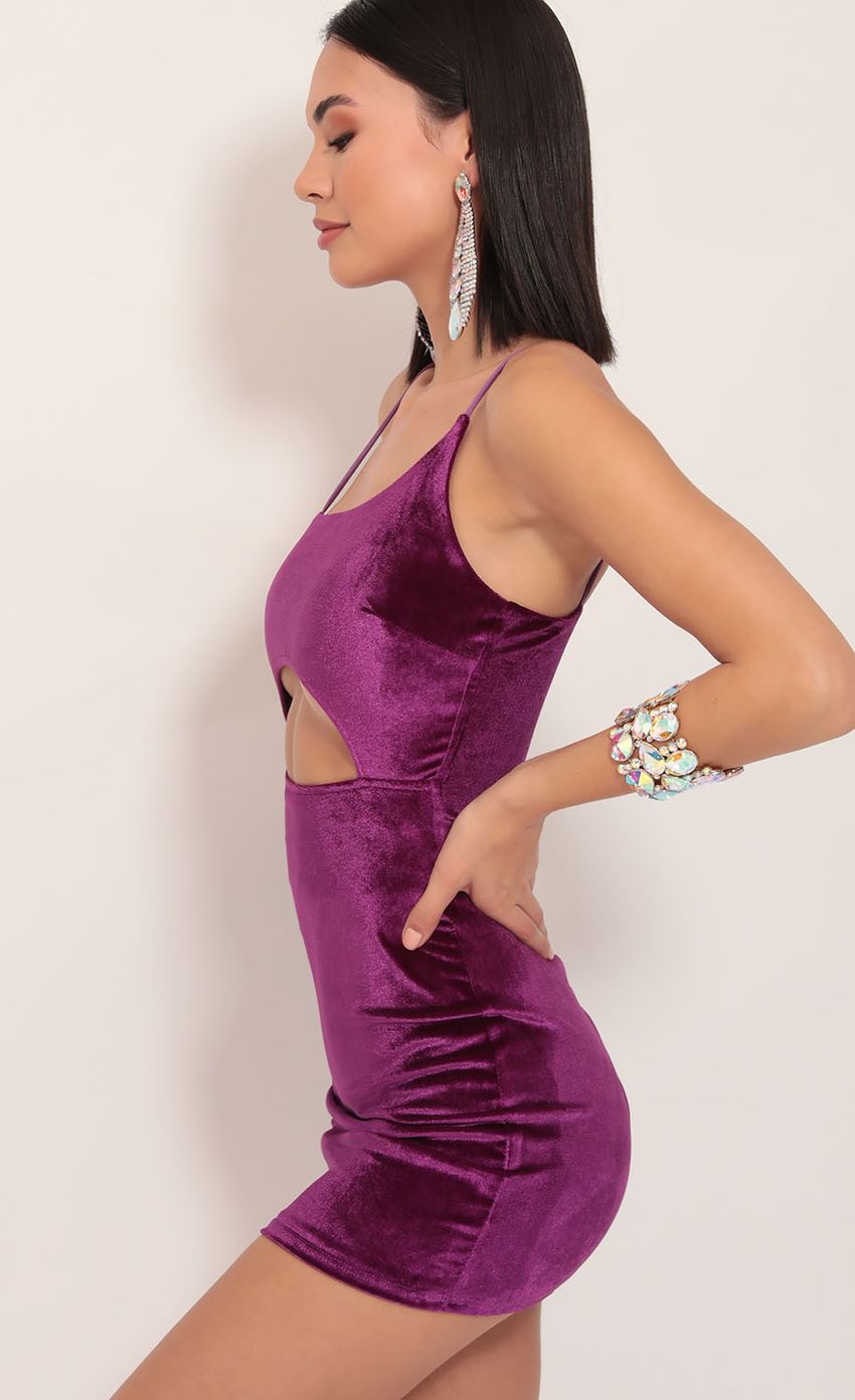 Picture Illusion Velvet Cutout Dress in Magenta. Source: https://media-img.lucyinthesky.com/data/Dec19_1/850xAUTO/781A11821.JPG
