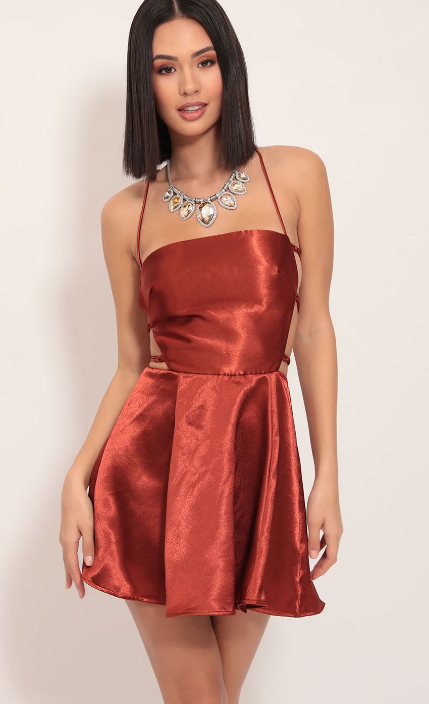 Picture Nina Satin Cutout A-line Dress in Rust. Source: https://media-img.lucyinthesky.com/data/Dec19_1/850xAUTO/781A2000.JPG
