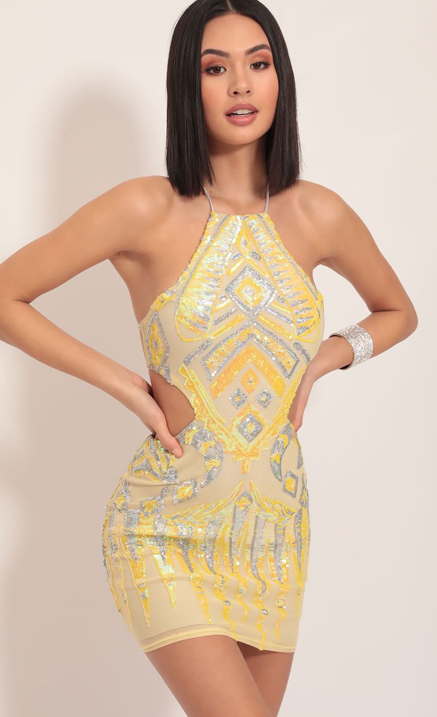 Picture Enchanting Halter Sequin Cutout Dress in Yellow. Source: https://media-img.lucyinthesky.com/data/Dec19_1/850xAUTO/781A2545.JPG