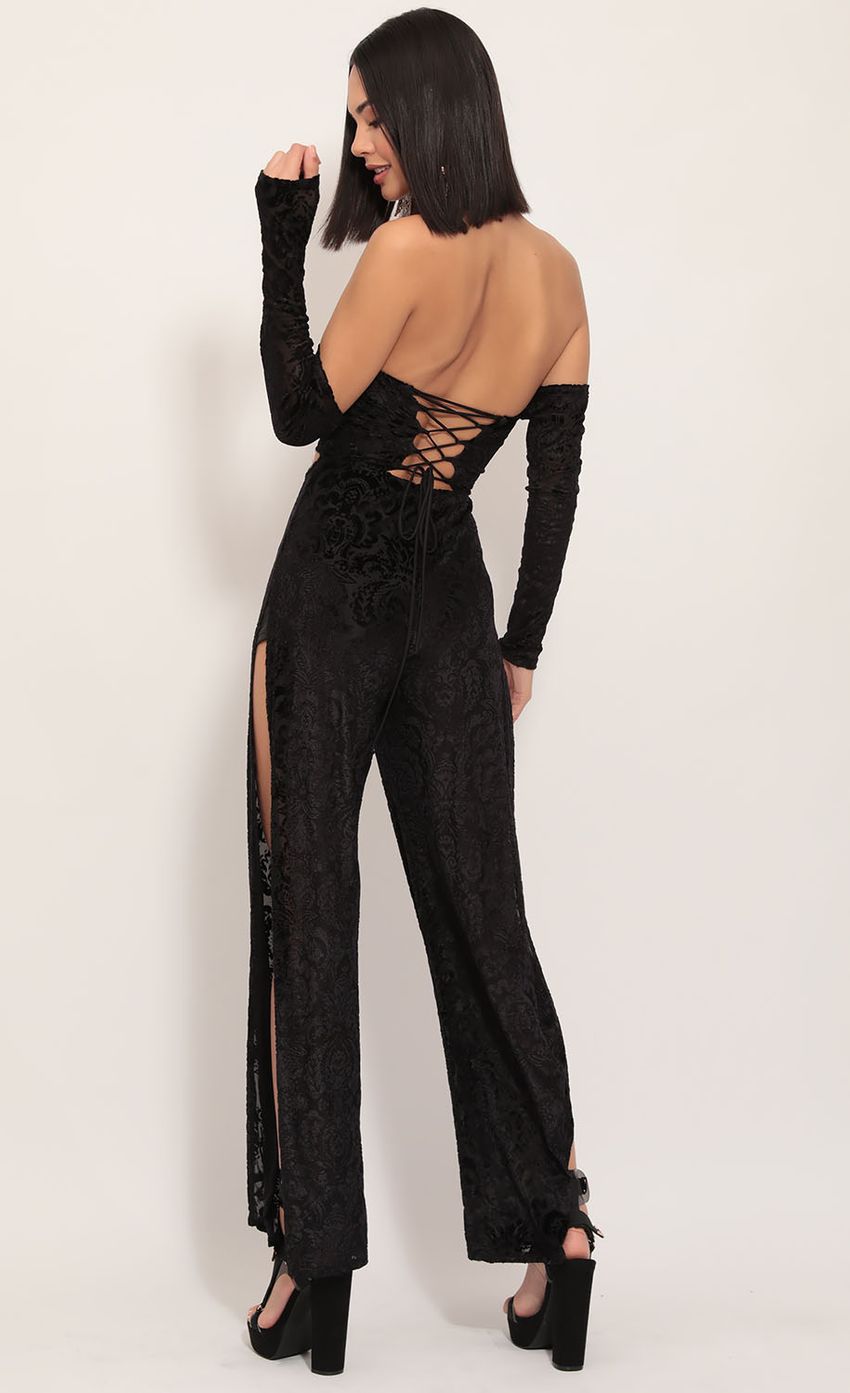 Picture Carina Cutout Jumpsuit in Black Burnout Velvet. Source: https://media-img.lucyinthesky.com/data/Dec19_2/850xAUTO/781A1787.JPG