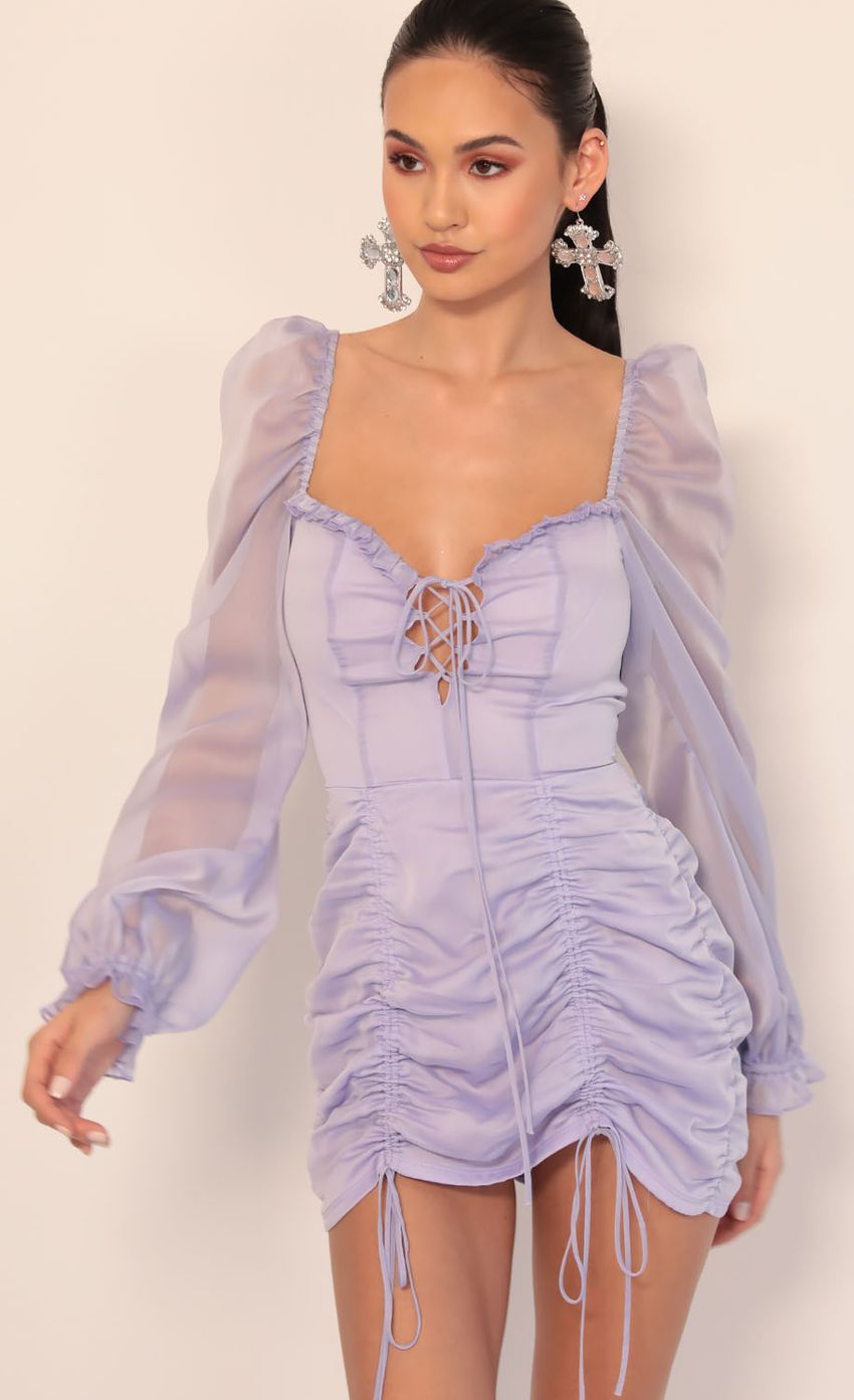 Picture Chiffon Puff Sleeve Dress in Lavender. Source: https://media-img.lucyinthesky.com/data/Dec19_2/850xAUTO/781A3773.JPG