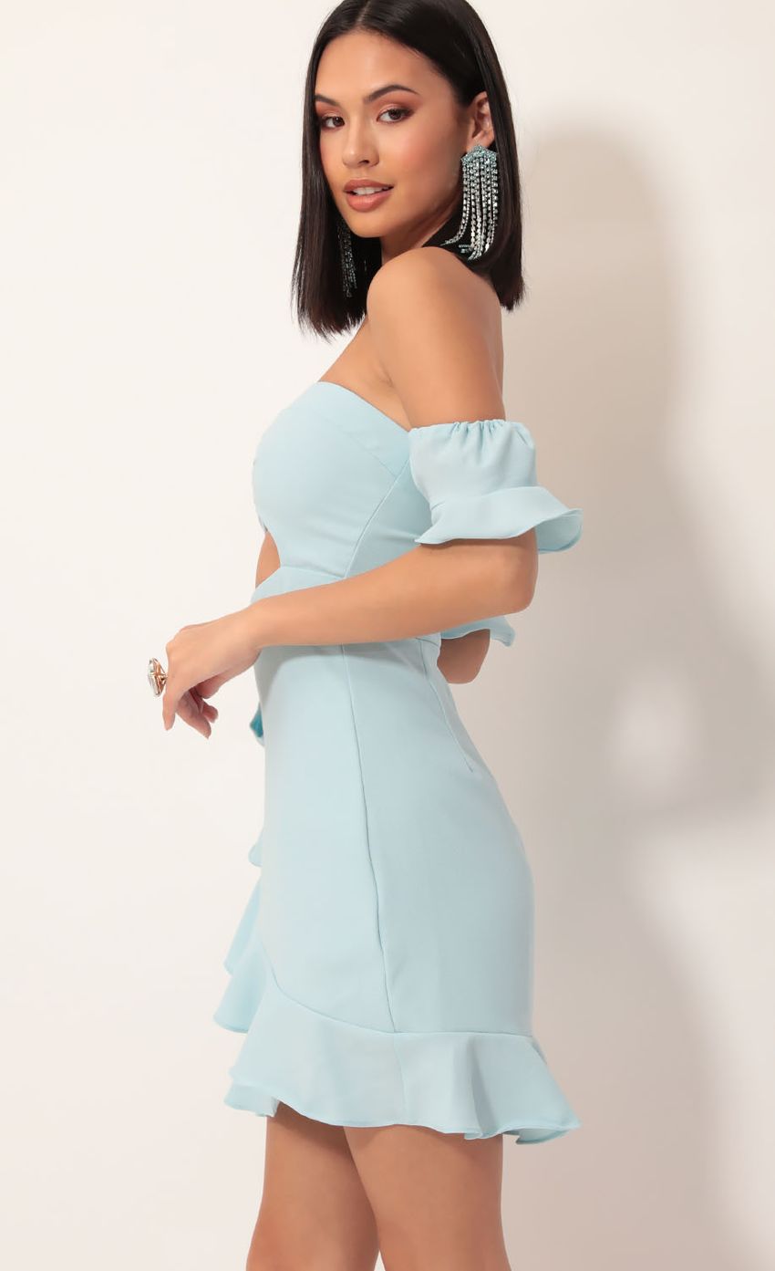Picture Melrose Off Shoulder Wrap Dress in Light Blue. Source: https://media-img.lucyinthesky.com/data/Dec19_2/850xAUTO/781A7999.JPG