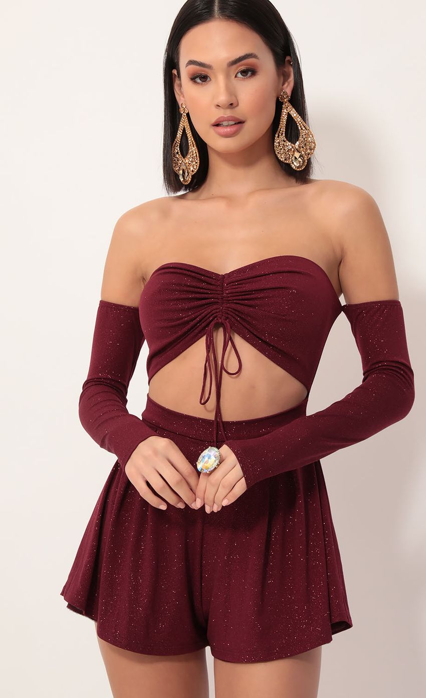 Picture Eve Cutout Romper in Sparkling Burgundy. Source: https://media-img.lucyinthesky.com/data/Dec19_2/850xAUTO/781A9166.JPG