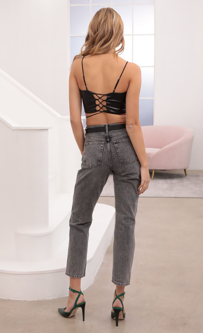 Picture Faux Leather Ruched Crop Top in Black. Source: https://media-img.lucyinthesky.com/data/Dec20_1/850xAUTO/1V9A0087.JPG