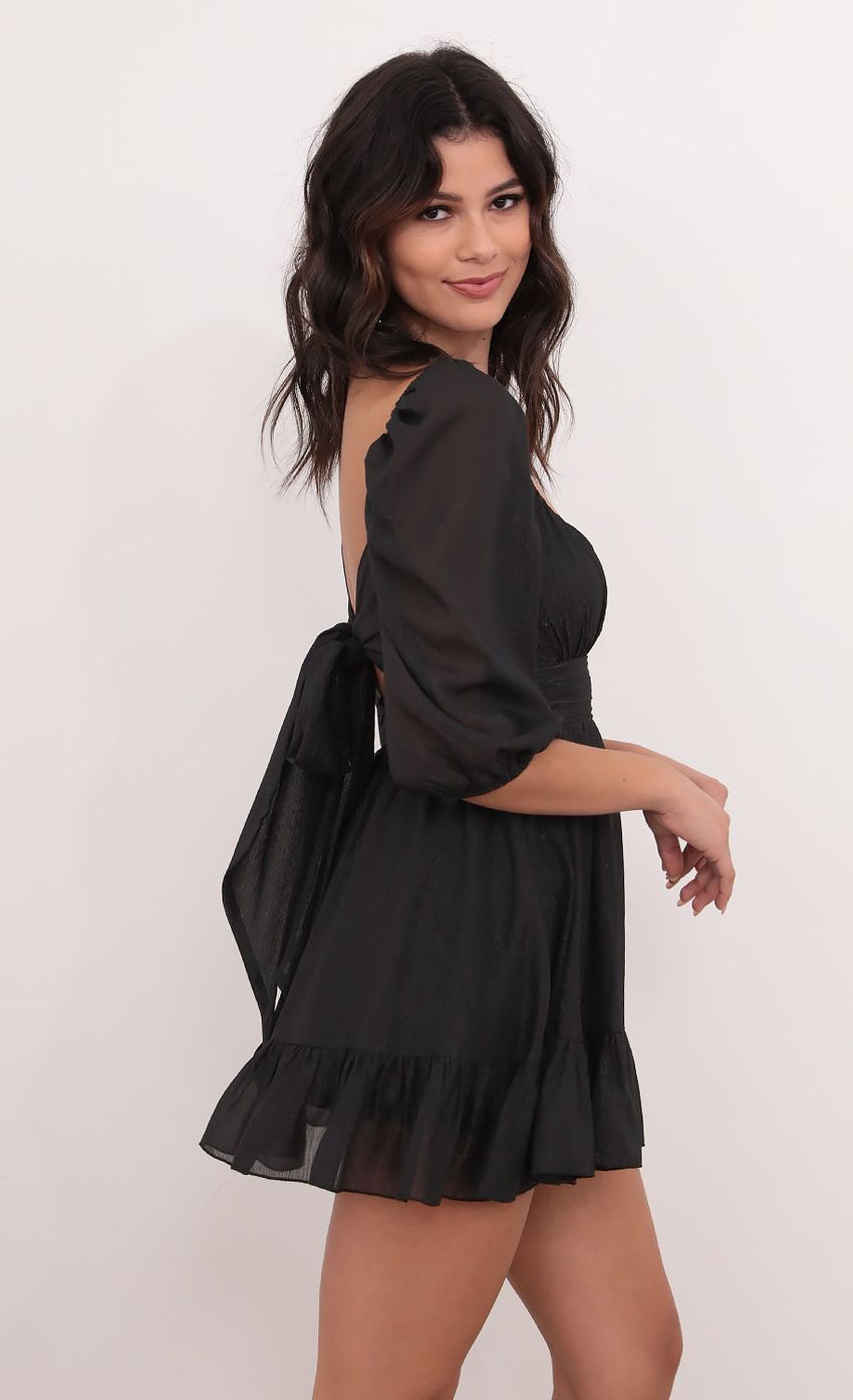 Picture Twinkle Babydoll Ruffle Dress in Black. Source: https://media-img.lucyinthesky.com/data/Dec20_1/850xAUTO/1V9A0190.JPG