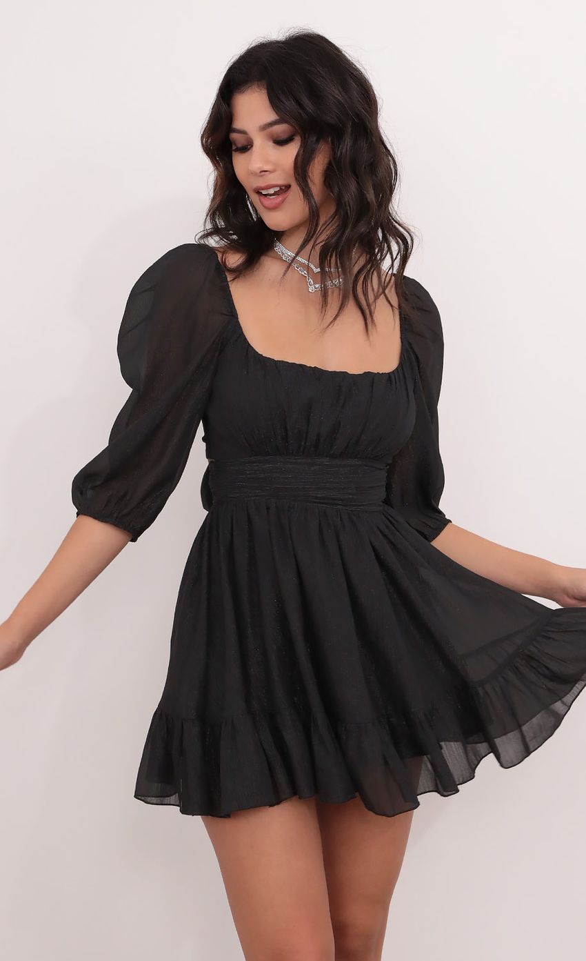 Picture Twinkle Babydoll Ruffle Dress in Black. Source: https://media-img.lucyinthesky.com/data/Dec20_1/850xAUTO/1V9A0228.JPG